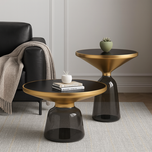 Two modern side tables with gold and black designs in a living room setting.