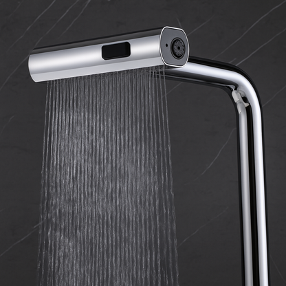 Kitchen faucet head with water flowing against a dark background