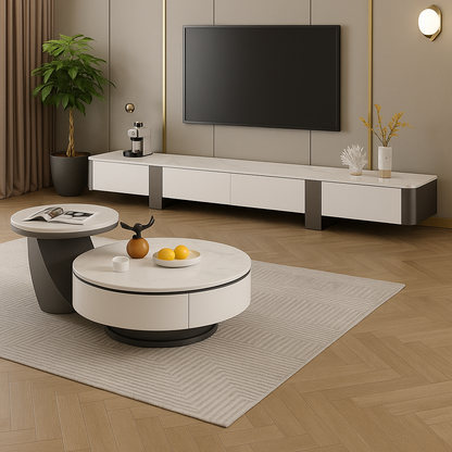 Modern living room with a white entertainment console, round coffee table, and decorative items.