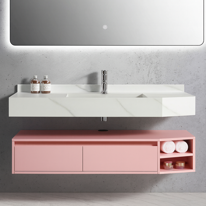 Wall-mounted pink bathroom vanity with marble countertop and open shelving. SAIBA Homes