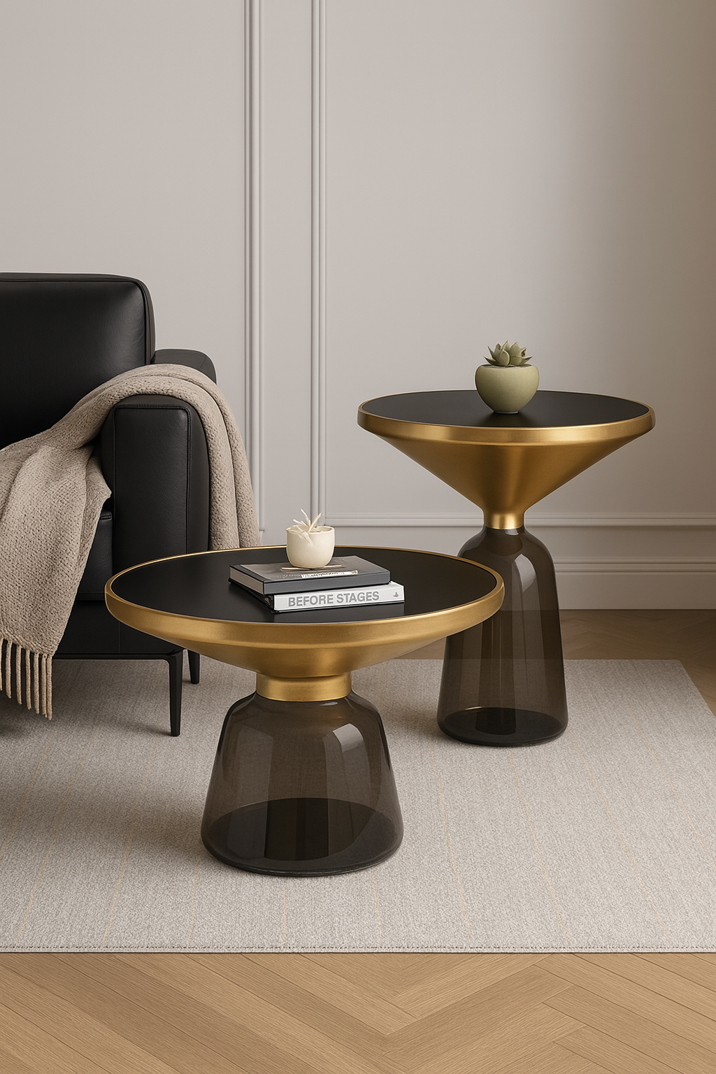 Two modern side tables with gold and smoked glass bases in a living room setting.