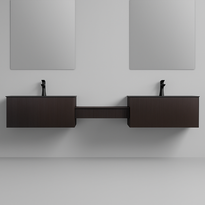 Modular floating double vanity with fluted dark cabinetry, dual basin stations, matte black faucets, and a central connecting shelf – SAIBA Homes.