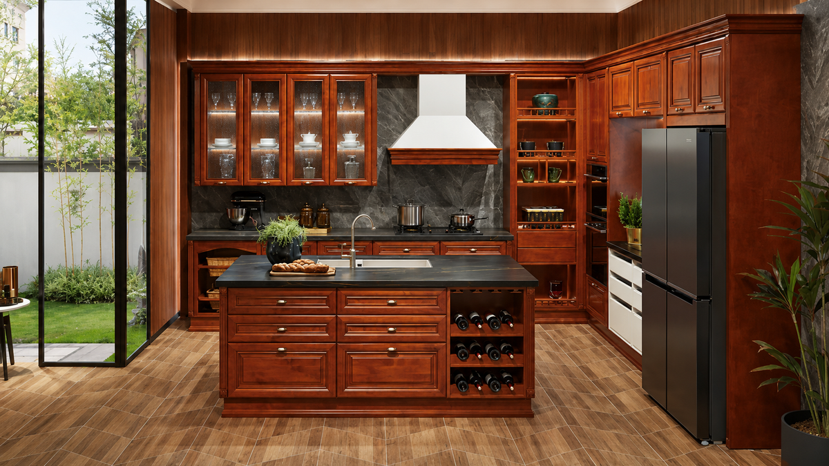A luxury kitchen cabinetry set in rich dark brown wood, featuring a central island with a black countertop, wine storage, glass-front upper cabinets, a white range hood, and a black refrigerator, set against a gray stone backsplash.