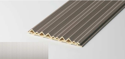 Hollow triangular fluted wall panel with brushed metallic finish, creating a modern angular feature wall detail, SAIBA Homes.