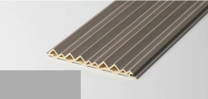 Hollow triangular fluted wall panel with smooth solid-colour finish and sharp geometric profile, bendable for curved walls — SAIBA Homes.