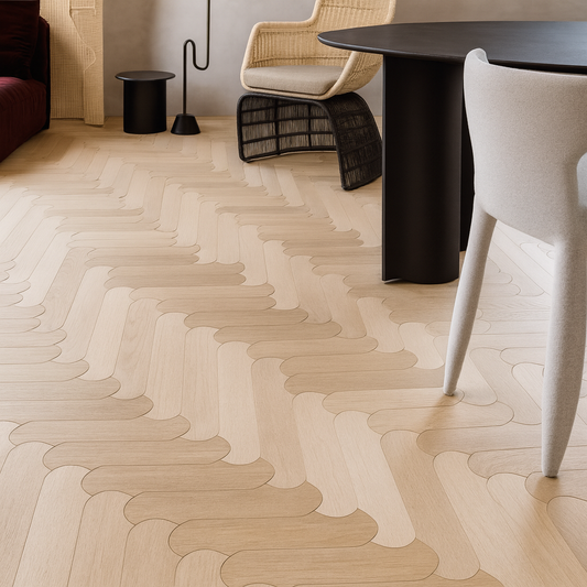 Curved-edge engineered hardwood flooring in light oak tones, flowing pattern — SAIBA Homes