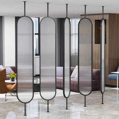 Modern oval-panel partition with matte black frame used as a semi-private divider in a luxury home