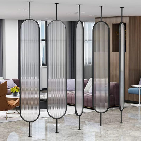 Modern oval-panel partition with matte black frame used as a semi-private divider in a luxury home