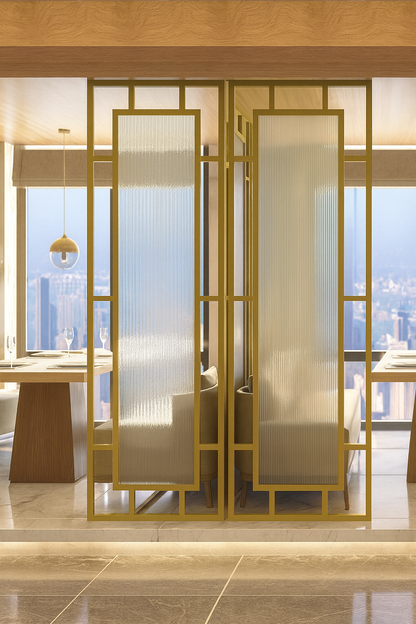 Modern semi-transparent gold room divider separating dining and lounge areas.