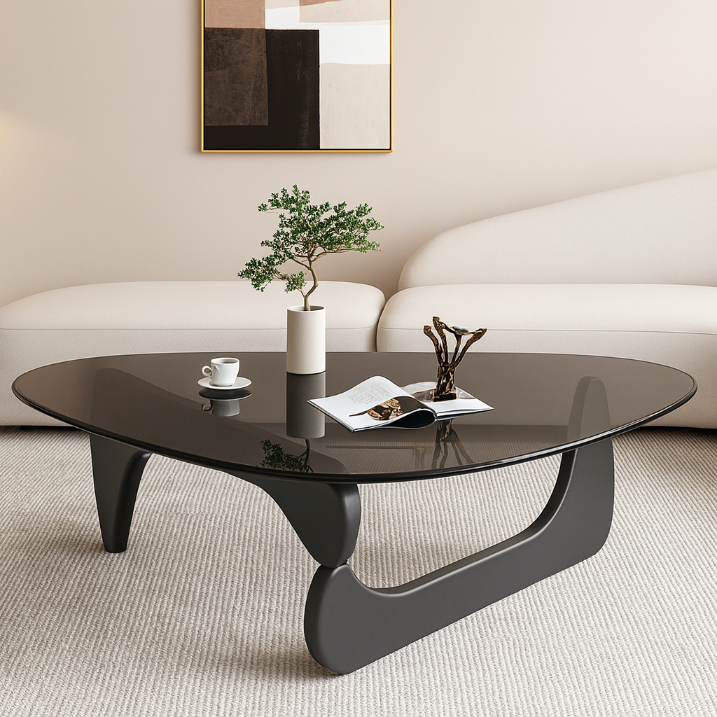 Modern coffee table with decorative items in a living room setting