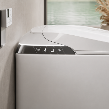 A close-up of a modern white appliance, likely a washing machine or dryer, showing its lid, control panel with icons, and a beige wall next to it.