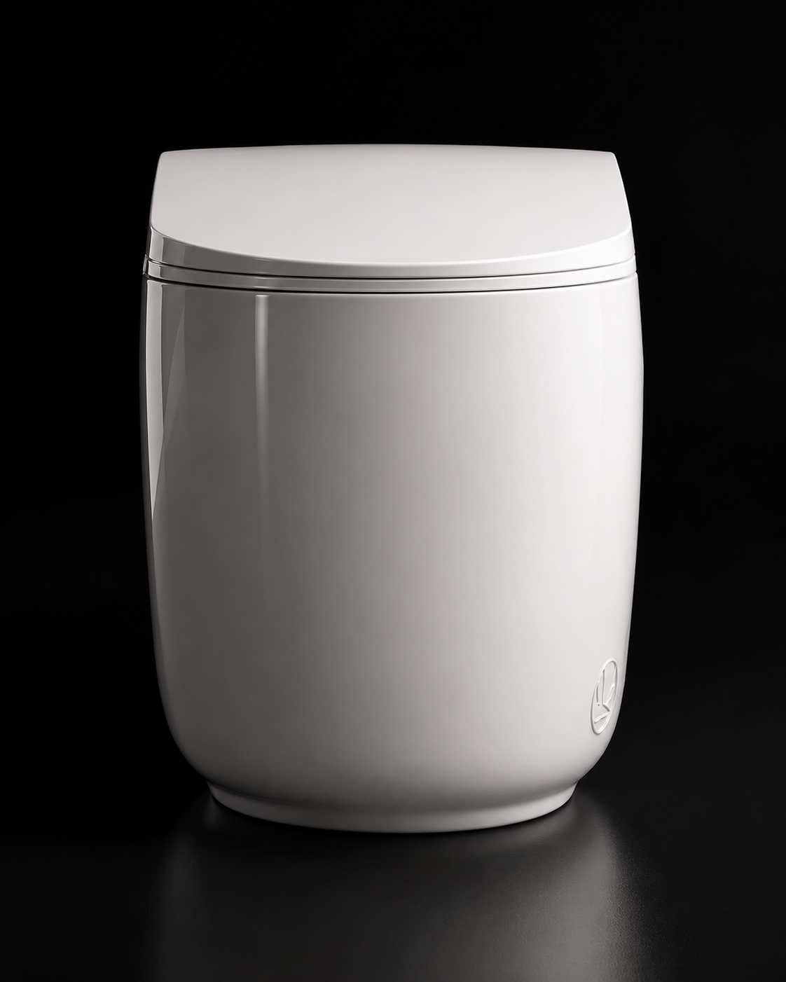 A modern, minimalist white toilet with a smooth, rounded body and a matching lid, set against a solid black background.
