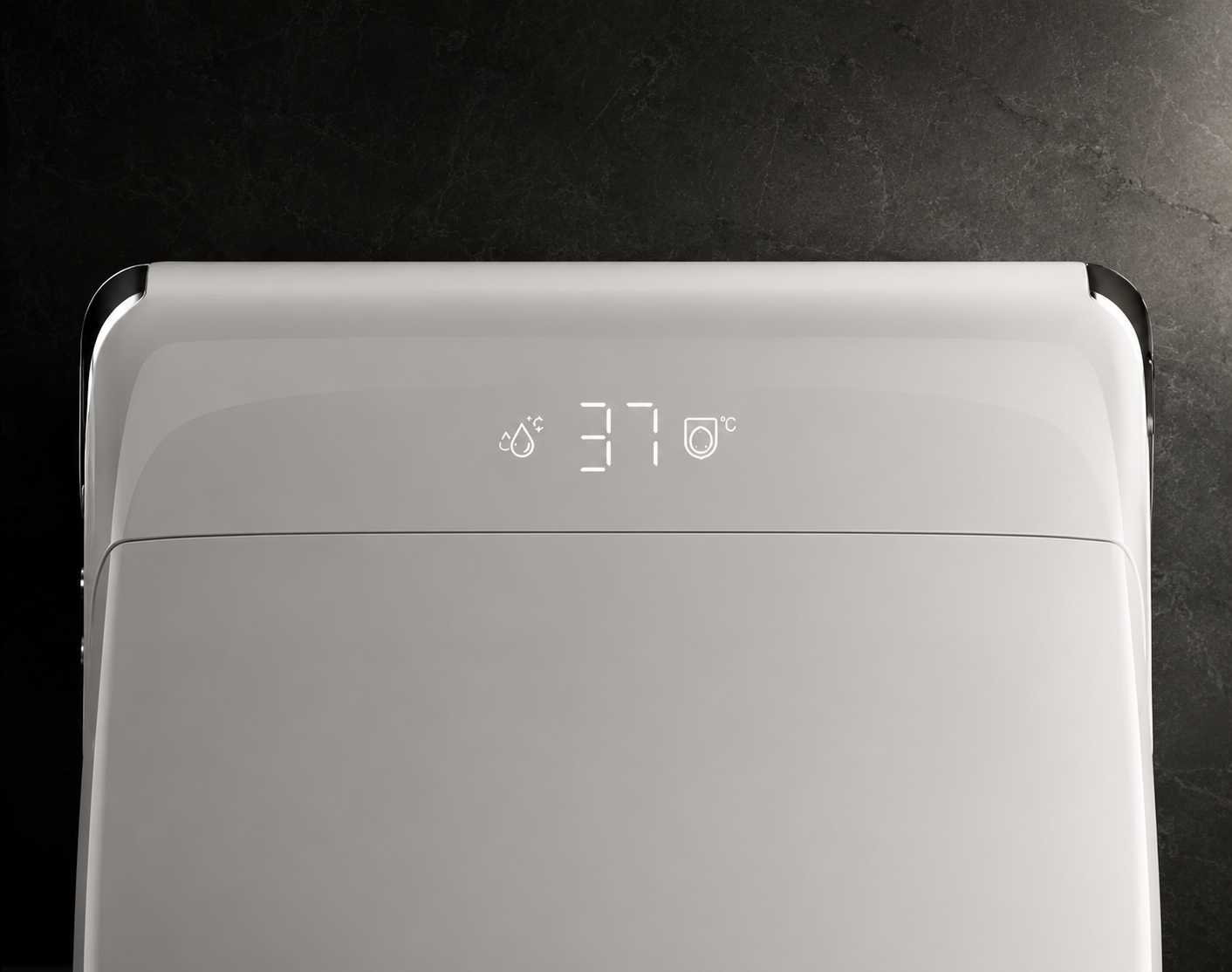 Close-up of a white modern appliance, likely a humidifier or air purifier, showing a digital temperature display reading 37 degrees Celsius on a dark textured background.