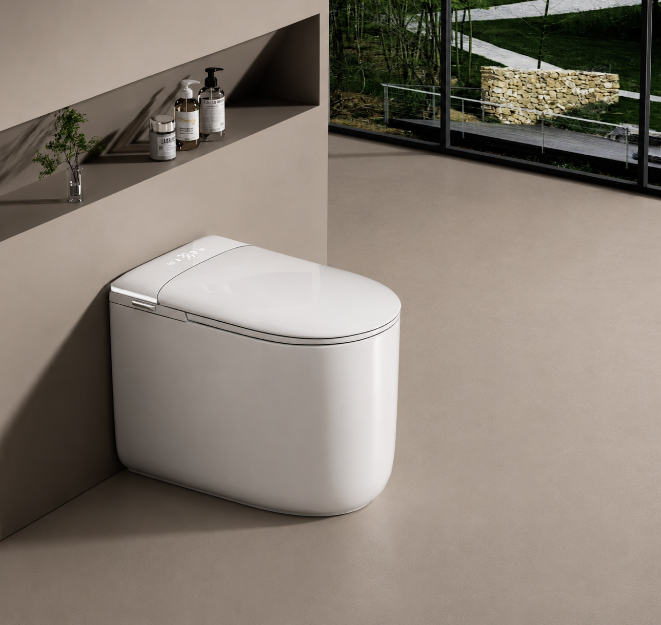 A modern white wall-mounted toilet with a closed lid, shown in a minimalist bathroom setting with beige walls and floor, a built-in shelf with toiletries, and a large window overlooking greenery.