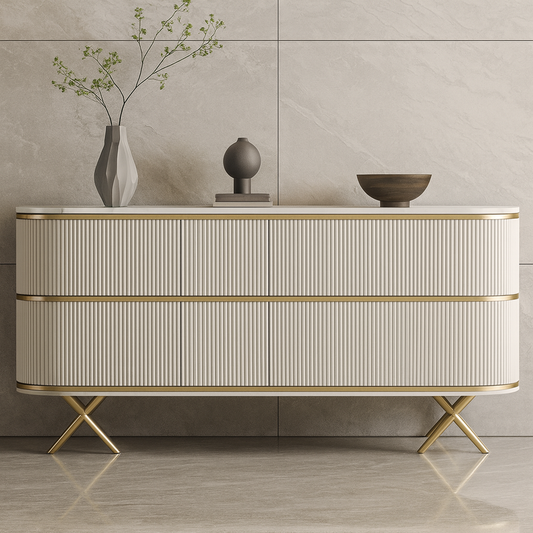Modern console with gold detailing and decorative items against a neutral wall