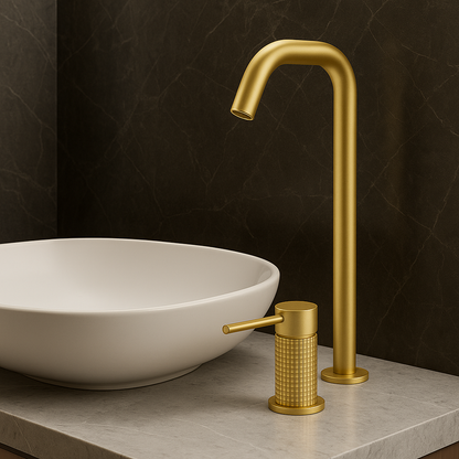 Brushed Gold Bathroom Faucet with textured handle beside white basin
