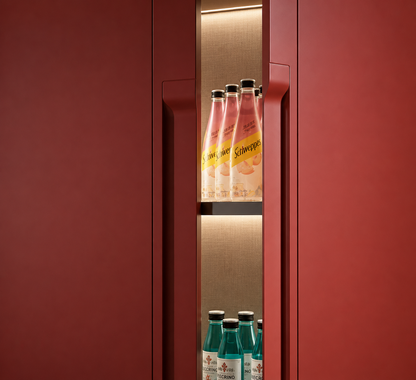 A modern red beverage refrigerator or wine cooler with illuminated shelves, stocked with pink and blue glass bottles, shown against a matching red exterior.