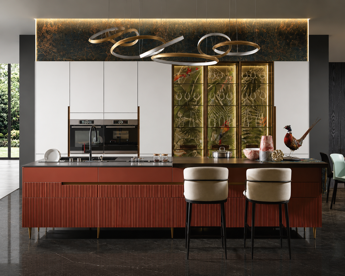 A luxury modern kitchen interior featuring a prominent reddish-brown ribbed island with two cream bar stools, a black countertop, stainless steel appliances, and a large decorative gold screen in the background.