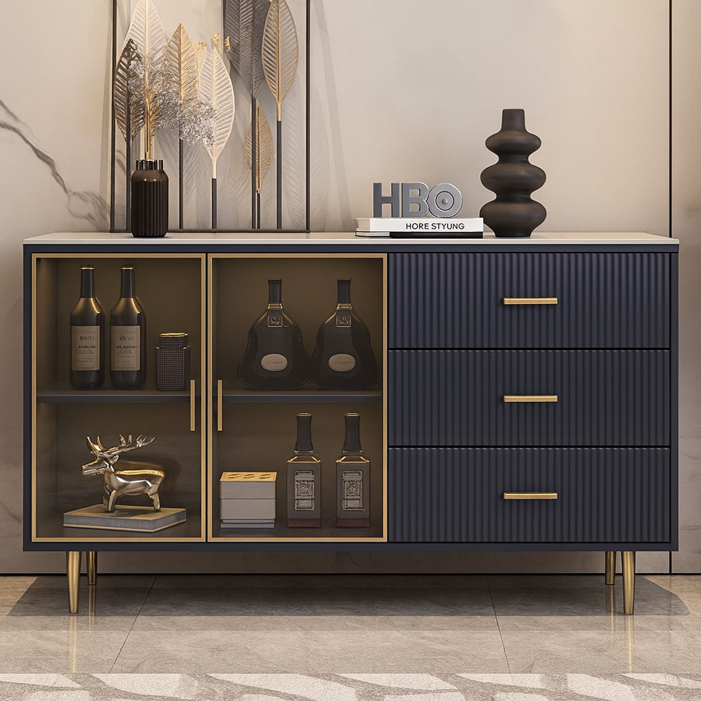 Modern navy blue console with glass doors and gold accents in a stylish room.
