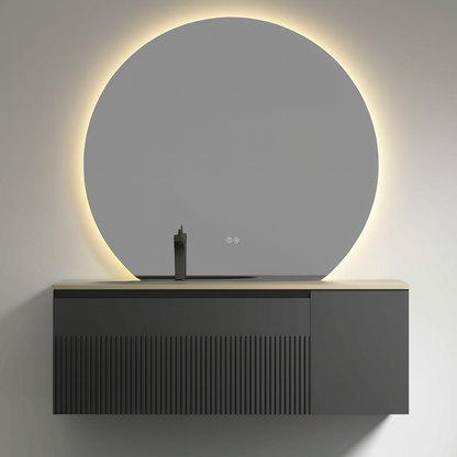 Fluted charcoal vanity with champagne integrated basin and halo-lit circular mirror