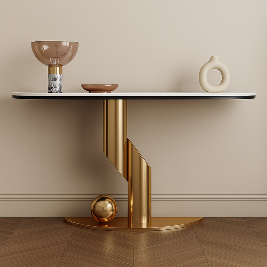 Modern side table with gold spiral leg and decorative items on a neutral background
