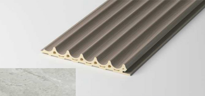 Hallow Inverted Fluted Wall Panel – Stone Edition with mineral-texture finish. SAIBA Homes