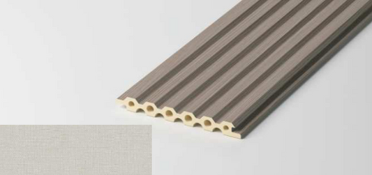 Close-up of cloth-textured wave fluted surface. SAIBA Homes